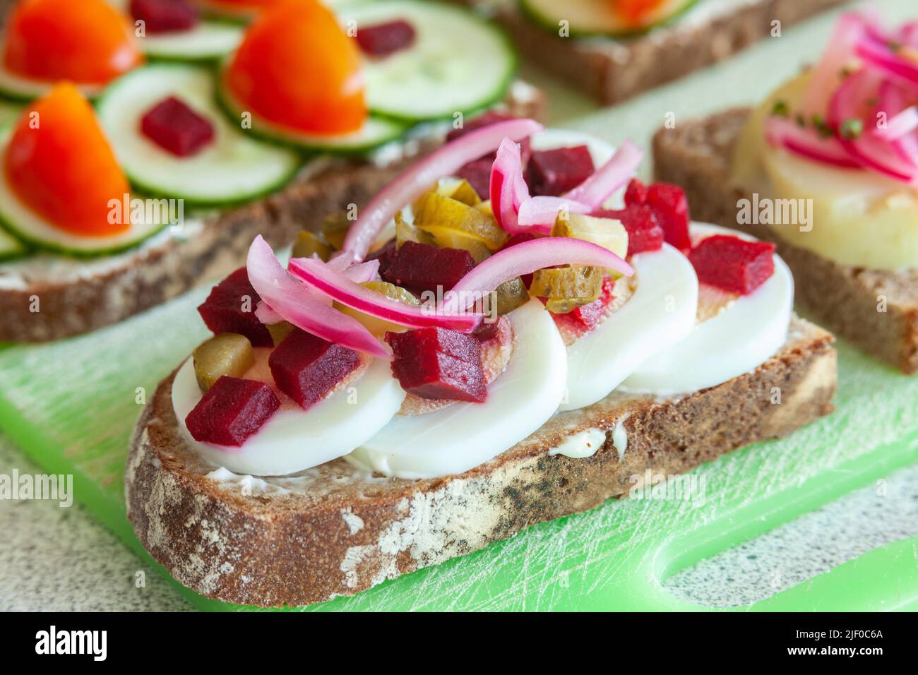 Danish style pickled red onion, gherkin, beetroot and egg open sandwich