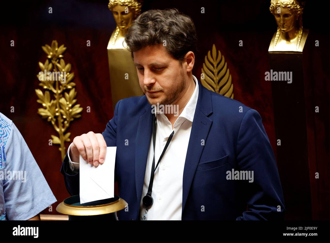 Julien Bayou, MP and co-president of the ecologist party Europe-Ecologie Les Verts (EELV) parliamentary group, votes during the opening session of the National Assembly in Paris, France, June 28, 2022. REUTERS/Sarah Meyssonnier Stock Photo