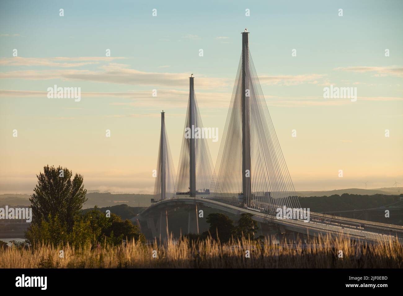 The Queensferry Crossing the new bridge over the Firth of Forth at sunrise, Edinburgh Scotland. Stock Photo
