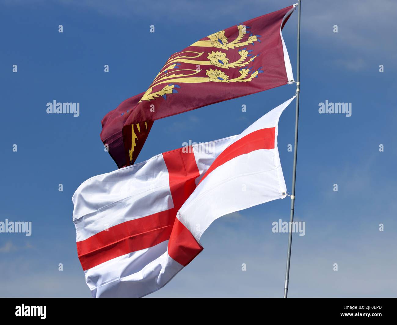 Flags of England: Saint George's Cross and Three gold lions, a Royal Banner of England Stock Photo