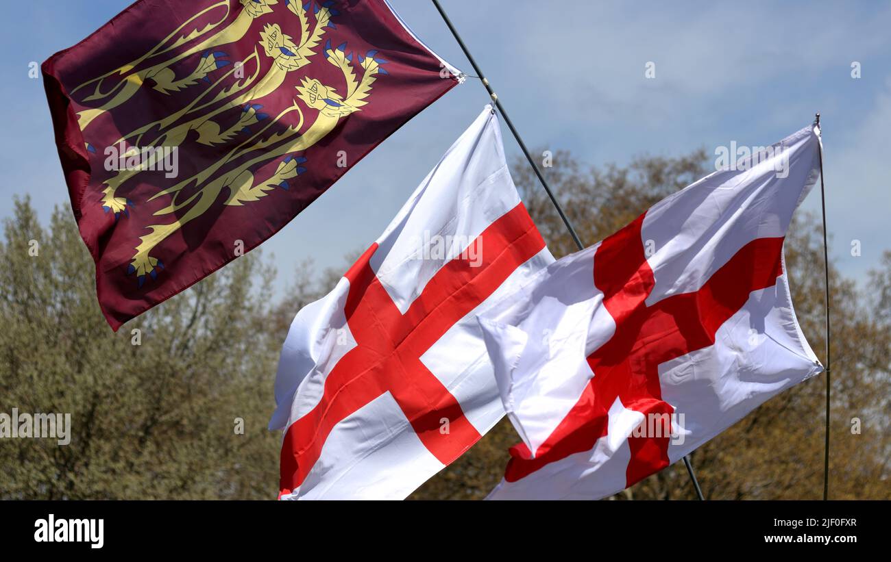 Flags of England: Saint George's Cross and Three gold lions, a Royal Banner of England Stock Photo