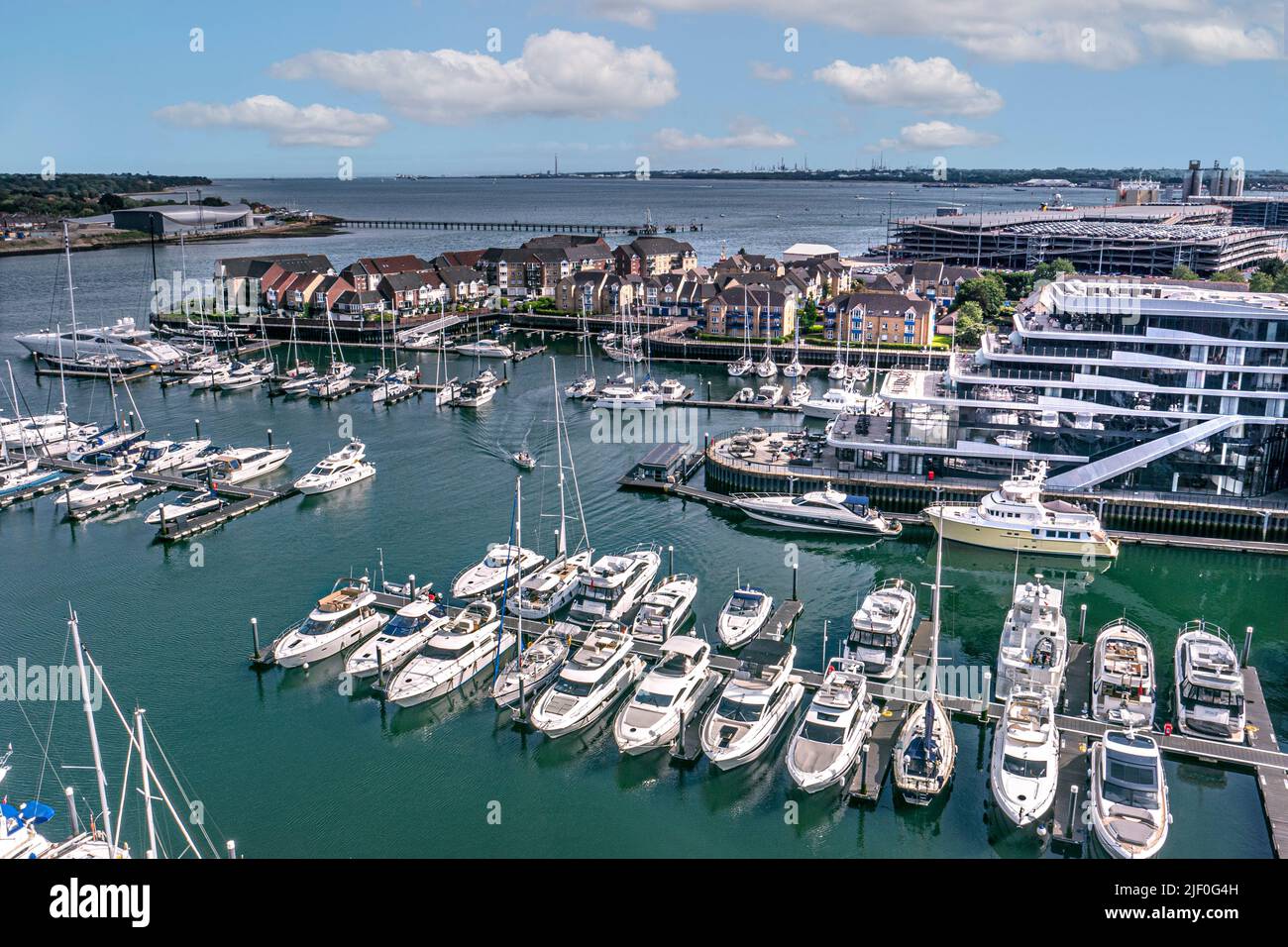 Ocean Village Southampton unique elevated view from Admirals Quay penthouse, luxury marina and yachts to The Isle of White Admirals Quay Hampshire UK Stock Photo