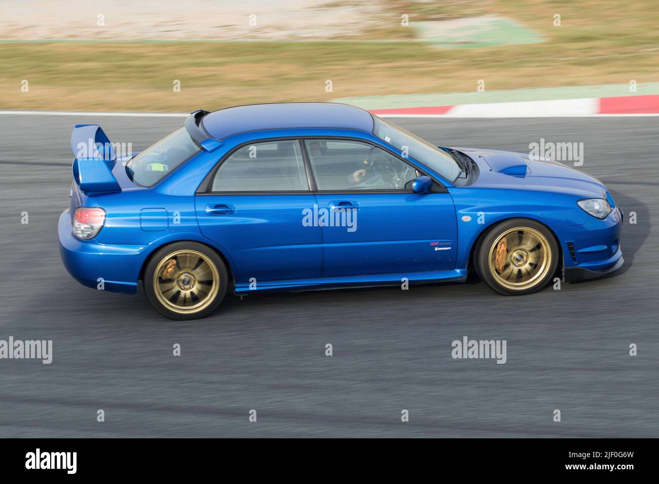 Modern AWD japan sports car in the track. Subaru Impreza Stock Photo