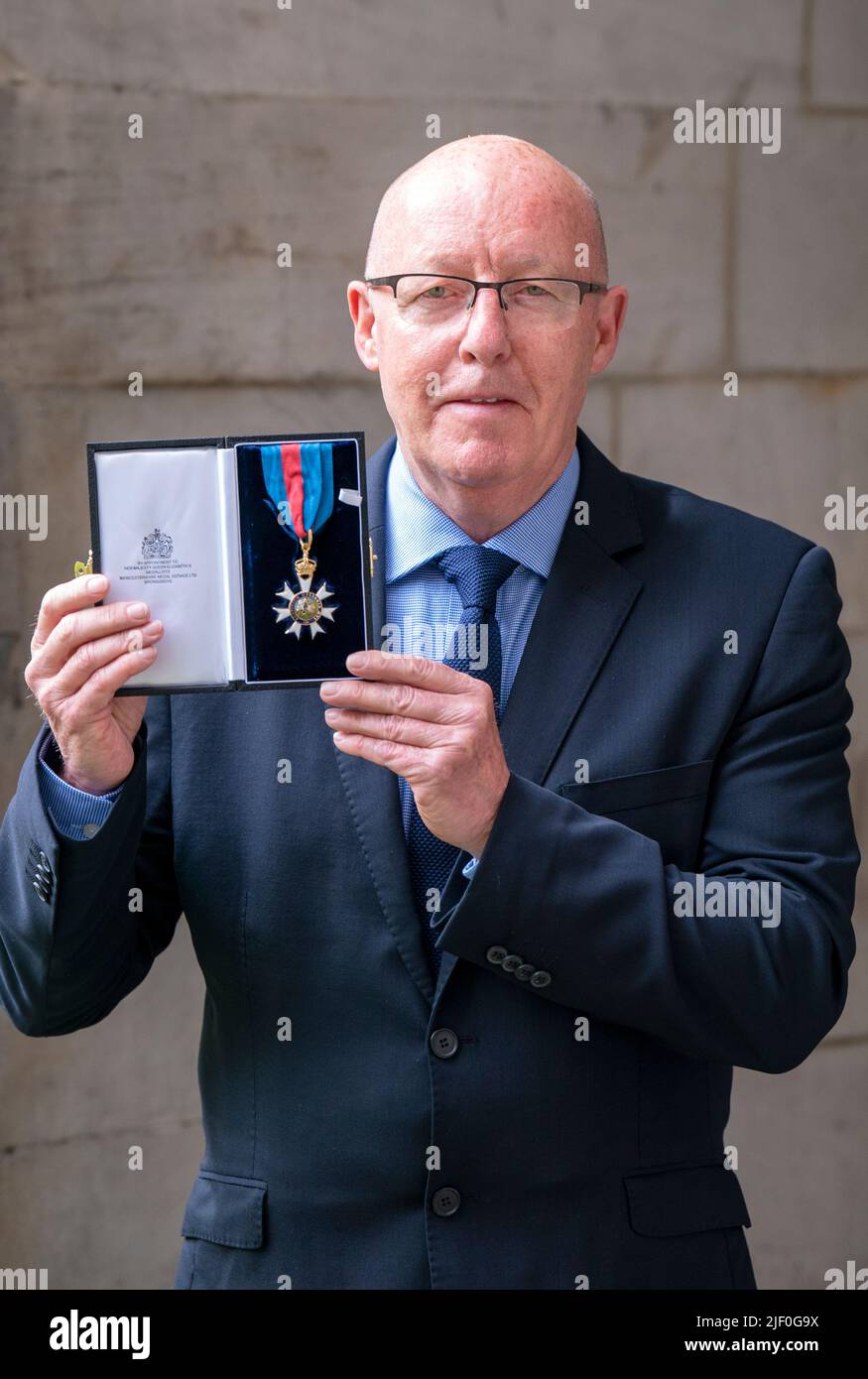 James McGoldrick after receiving the Order of Saint Michael and Saint