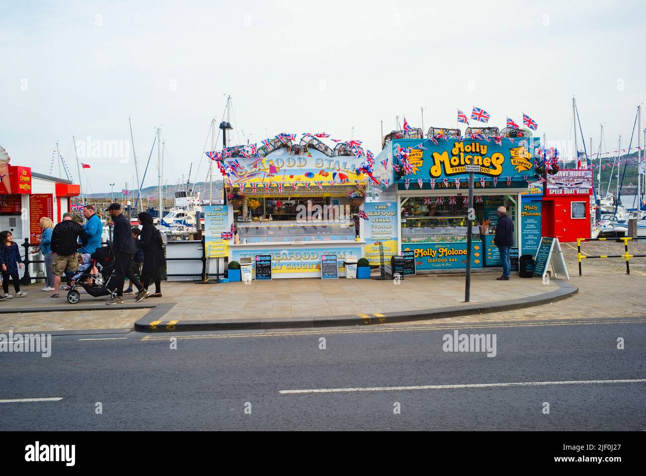 Two harbourside seafood stalls during the Platinum Jubilee bank holiday 2022 Stock Photo