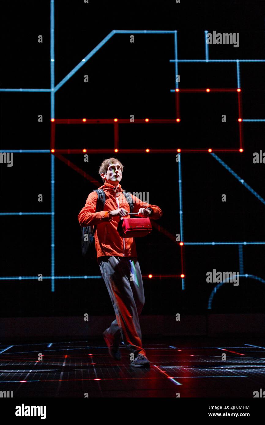 Graham Butler (Christopher Boone) in THE CURIOUS INCIDENT OF THE DOG IN THE NIGHT-TIME by Simon Stephens at the Gielgud Theatre, London W1  08/07/2014  a National Theatre production  adapted from the novel by Mark Haddon  design: Bunny Christie  lighting: Paule Constable  video design: Finn Ross  director: Marianne Elliott Stock Photo