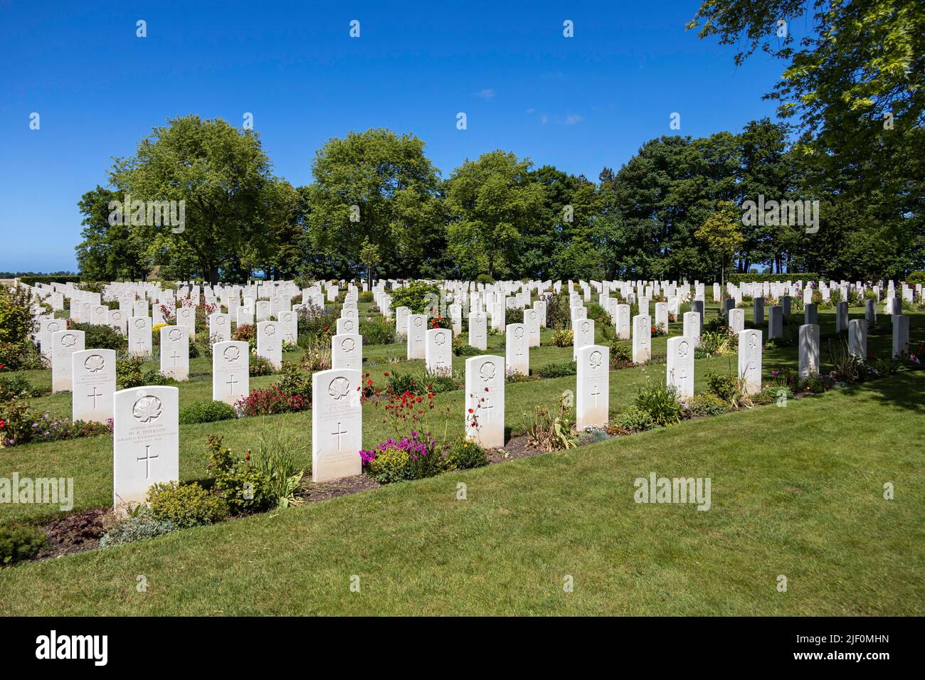 Graves of casualties of the D-Day landings at the Beny Sur Mer War Cemetery Stock Photo