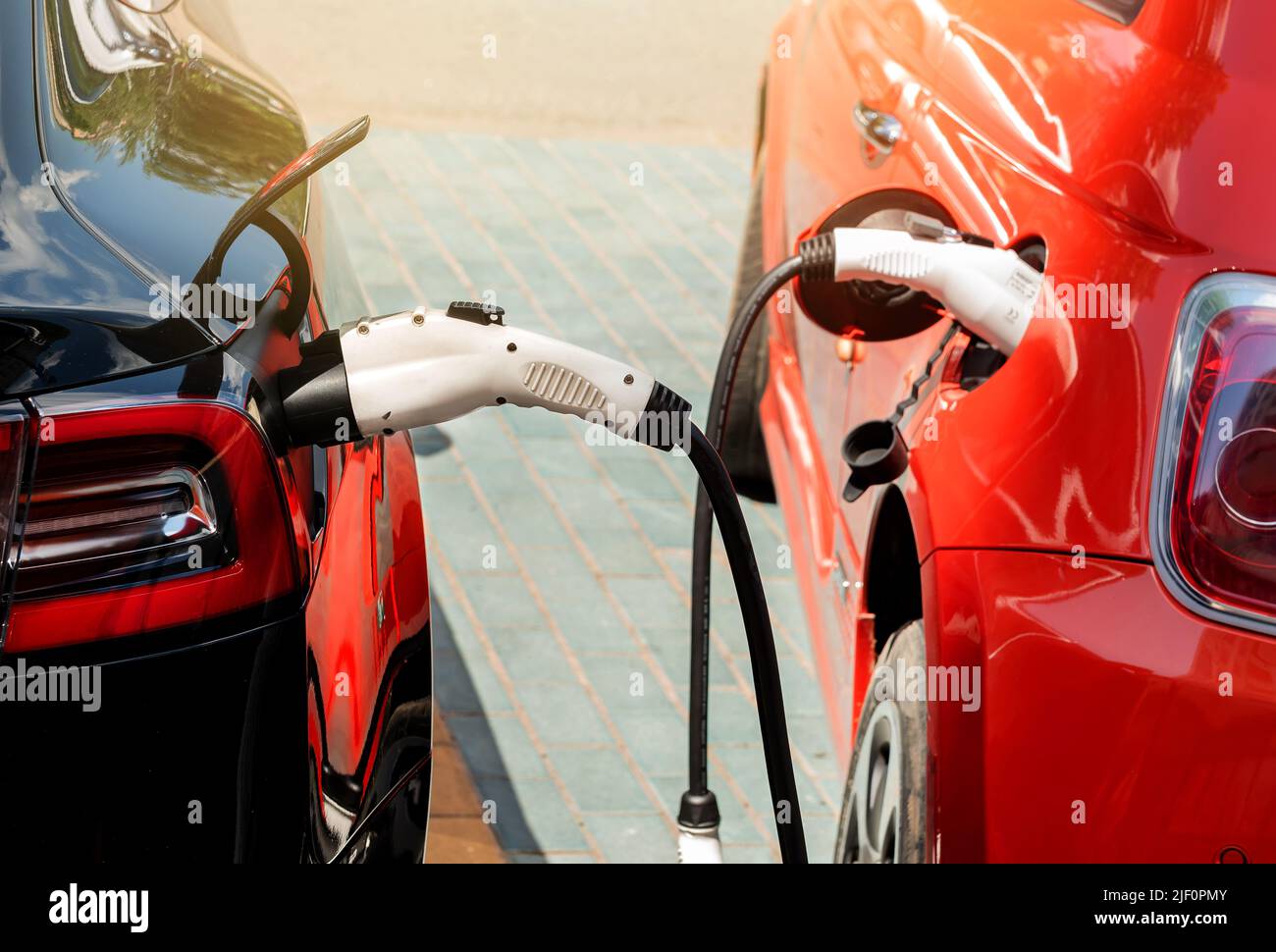 Electric car at the charging station. Ecology. Eco-friendly transport ...