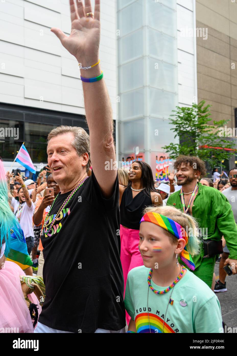 John Tory, Mayor of Toronto, and his granddaughter Isabel (right) who came out during this year Pride Celebrations. They are marching together in Prid Stock Photo