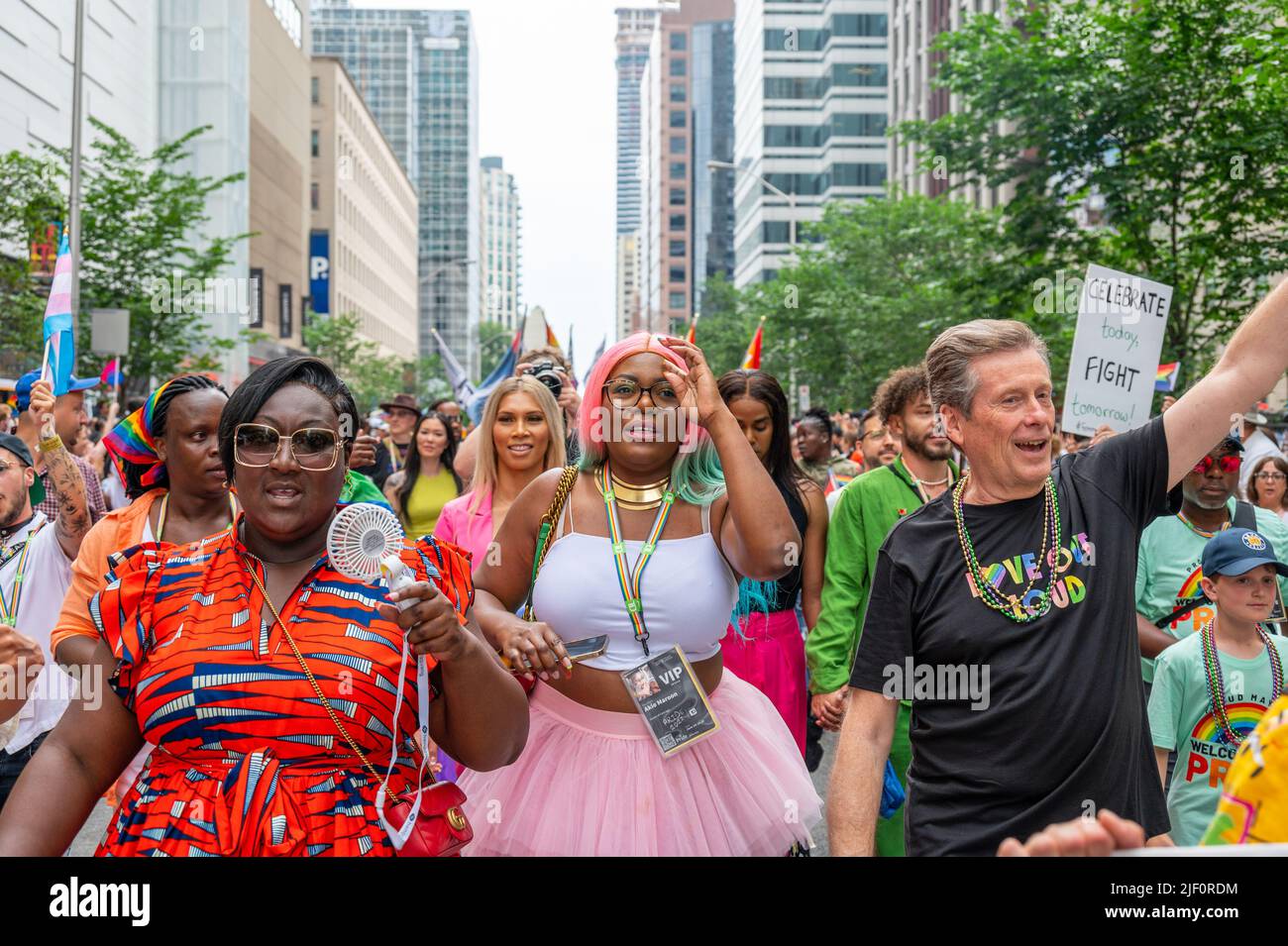 Lady Phyll, Akio Maroon, and John Tory (left to right) marching in Bloor Street during Pride Parade Stock Photo