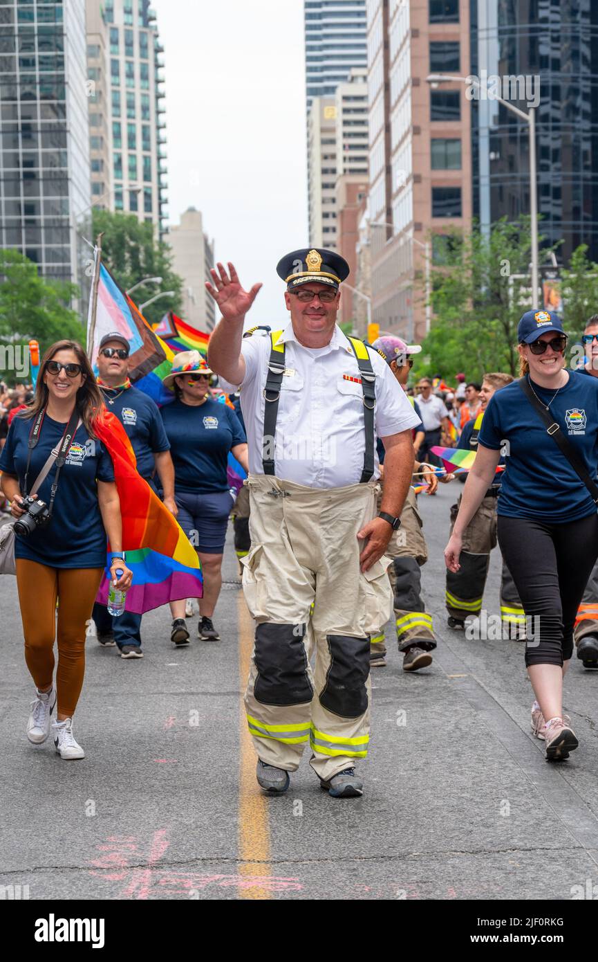 Firefighter Chief Matthew Pegg marches in Bloor Street during Pride Parade Stock Photo