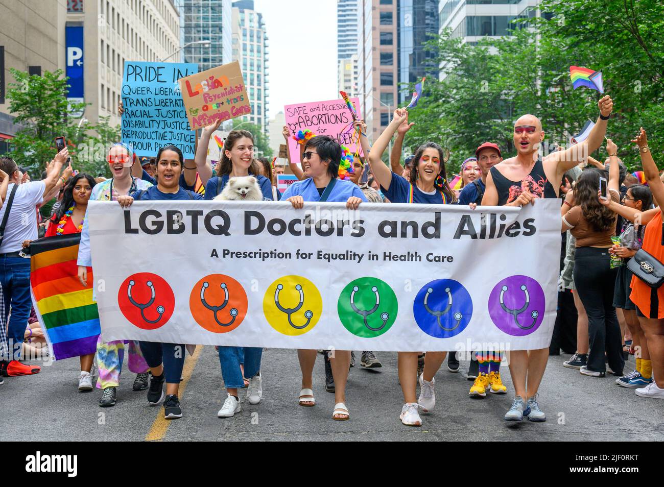 A group of people belonging to the LGBTQ Doctors And Allies marches in Bloor Street during Pride Parade Stock Photo