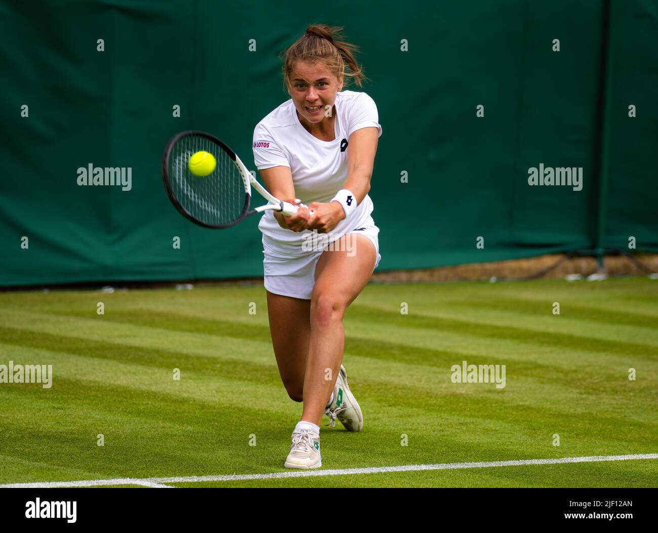 Maja Chwalinska of Poland in action against Katerina Siniakova of the Czech Republic during the first round of the 2022 Wimbledon Championships, Grand Slam tennis tournament on June 27, 2022 at All England Lawn Tennis Club in Wimbledon near London, England - Photo: Rob Prange/DPPI/LiveMedia Stock Photo