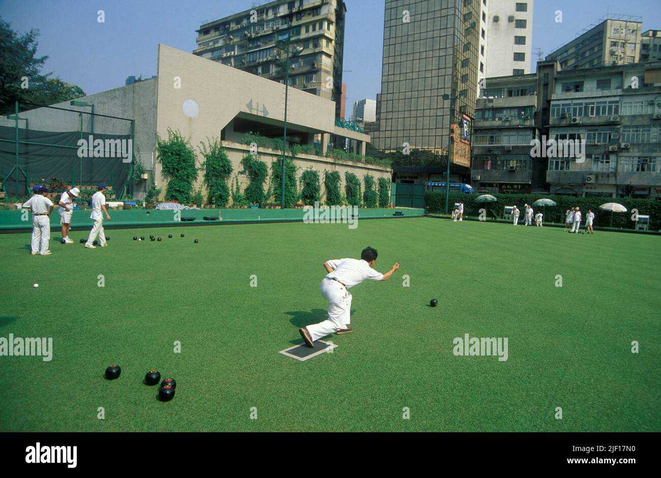 a game of the british sport Outdoor Bowling at a greens in Hong Kong