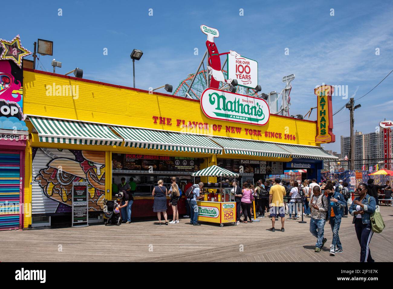 Nathan's Famous fast food restaurant on Riegelmann Boardwalk in Coney Island amusement park in Brooklyn borough of New York City, United States Stock Photo