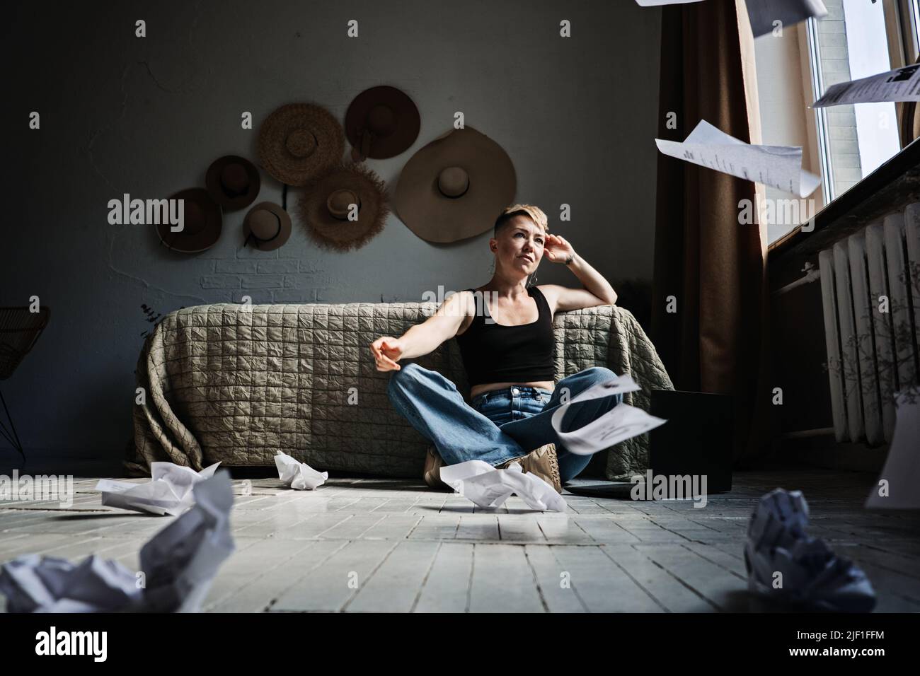 Job burnout, chronic workplace stress, exhaustion. Angry stressed out young woman working on laptop Stock Photo