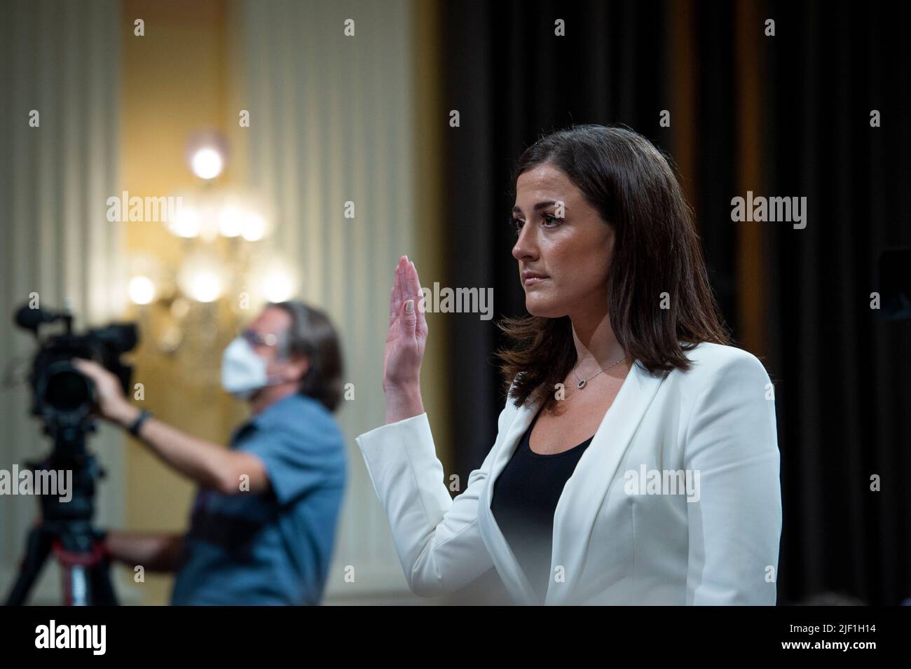 Cassidy Hutchinson, an aide to former White House Chief of Staff Mark Meadows, is sworn-in on day six of the United States House Select Committee to Investigate the January 6th Attack on the US Capitol hearing on Capitol Hill in Washington, DC on June 28, 2022. Credit: Rod Lamkey/CNP Stock Photo