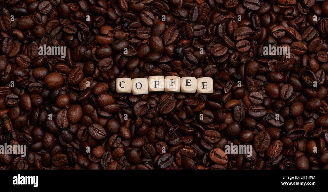 the word coffee in the middle of a lot of coffee beans Stock Photo Alamy
