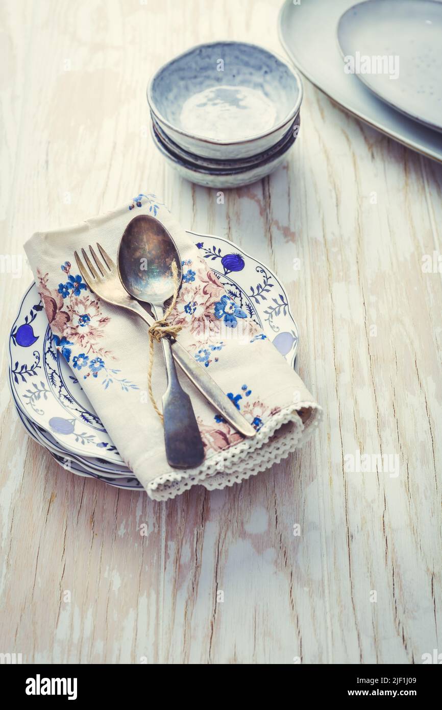Sustainability concept - stoneware and kitchenware on wooden kitchen table Stock Photo