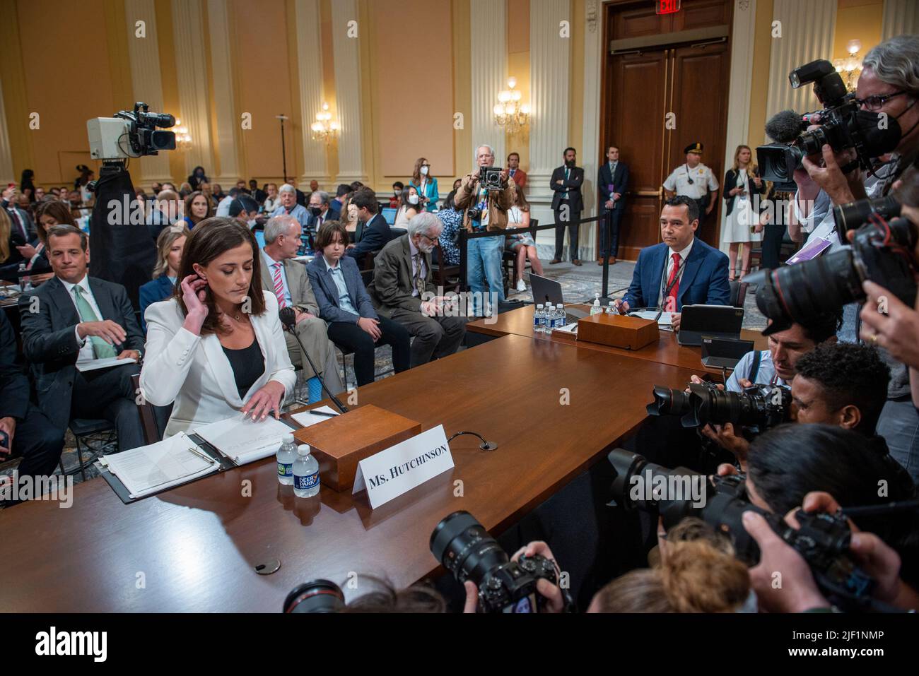 Washington, United States Of America. 28th June, 2022. Cassidy Hutchinson, an aide to former White House Chief of Staff Mark Meadows, takes her seat at the witness table on day six of the United States House Select Committee to Investigate the January 6th Attack on the US Capitol hearing on Capitol Hill in Washington, DC on June 28, 2022. Credit: Rod Lamkey/CNP/Sipa USA Credit: Sipa USA/Alamy Live News Stock Photo