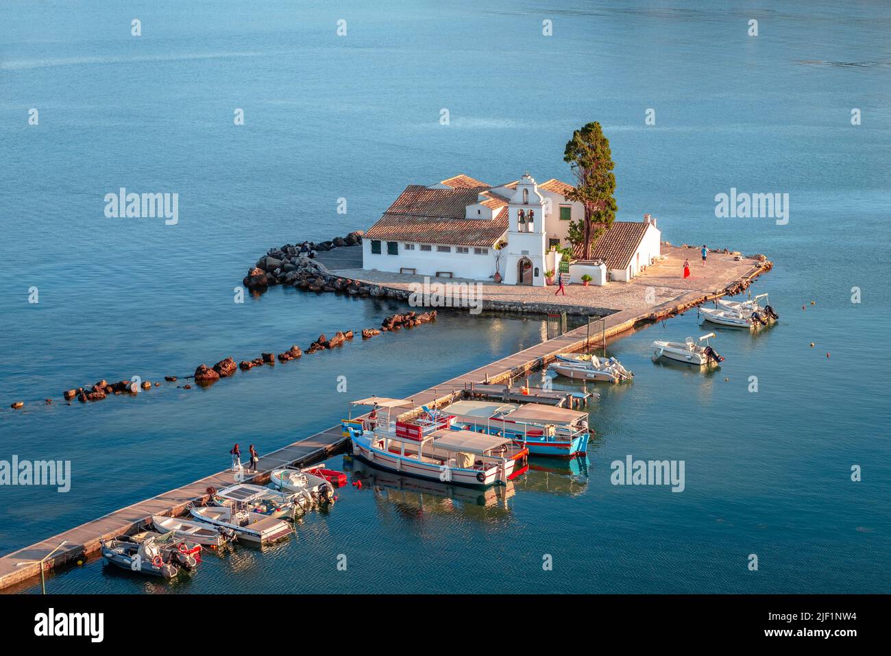Corfu, Greece - June 2 2022: The Holy Monastery of Vlacherna, connected to the mainland by a pedestrian bridge, in Kanoni district. Stock Photo