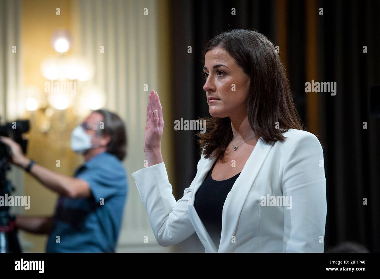 Cassidy Hutchinson, an aide to former White House Chief of Staff Mark Meadows, is sworn-in on day six of the United States House Select Committee to Investigate the January 6th Attack on the US Capitol hearing on Capitol Hill in Washington, DC on June 28, 2022. Credit: Rod Lamkey/CNP /MediaPunch Stock Photo