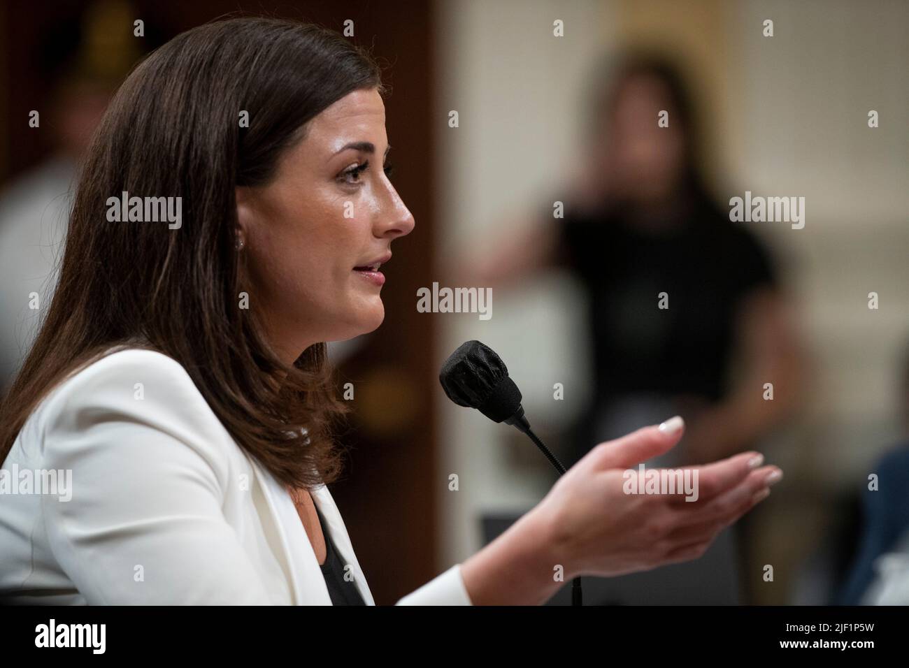 Cassidy Hutchinson, an aide to former White House Chief of Staff Mark Meadows, responds to questions on day six of the United States House Select Committee to Investigate the January 6th Attack on the US Capitol hearing on Capitol Hill in Washington, DC on June 28, 2022. Credit: Rod Lamkey/CNP Stock Photo