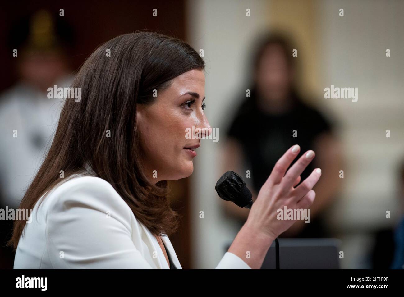 Cassidy Hutchinson, an aide to former White House Chief of Staff Mark Meadows, responds to questions on day six of the United States House Select Committee to Investigate the January 6th Attack on the US Capitol hearing on Capitol Hill in Washington, DC on June 28, 2022. Credit: Rod Lamkey/CNP Stock Photo