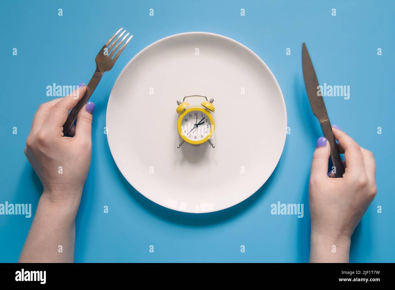 Fork knife clock hands hi-res stock photography and images - Alamy
