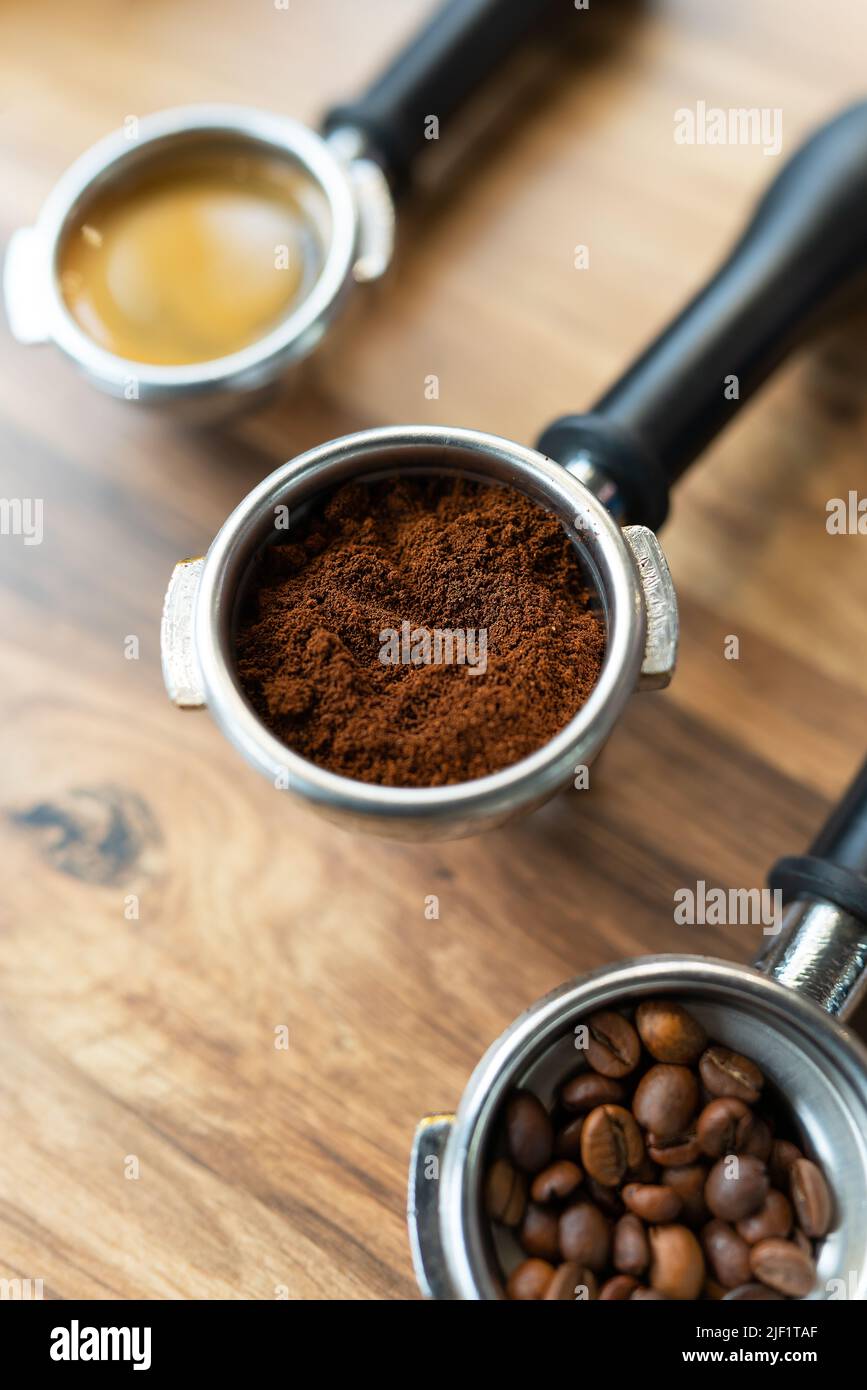 Different processes of preparing coffee by a barista in a coffee shop