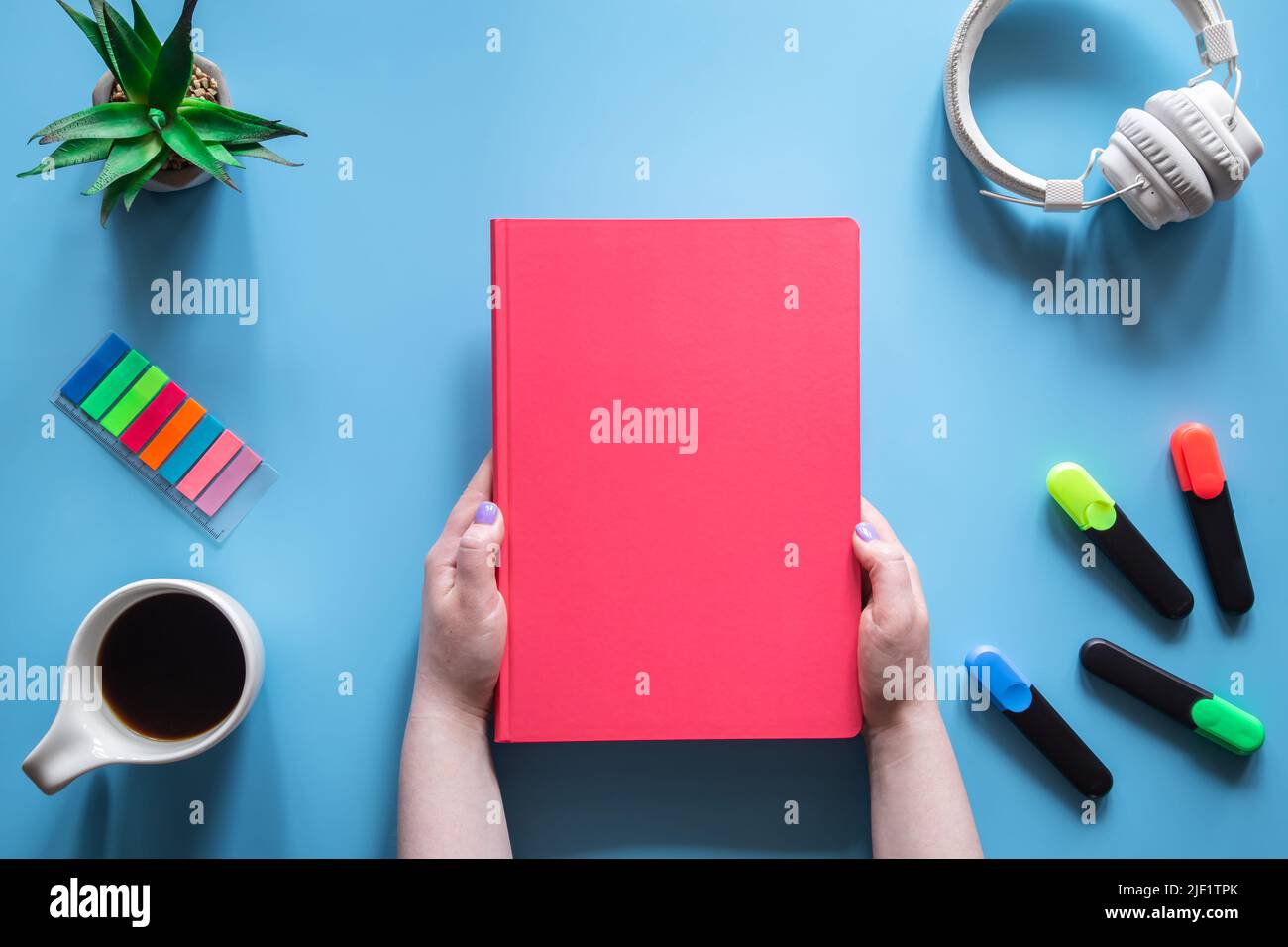 Flat lay composition on the theme of school and study with a pink