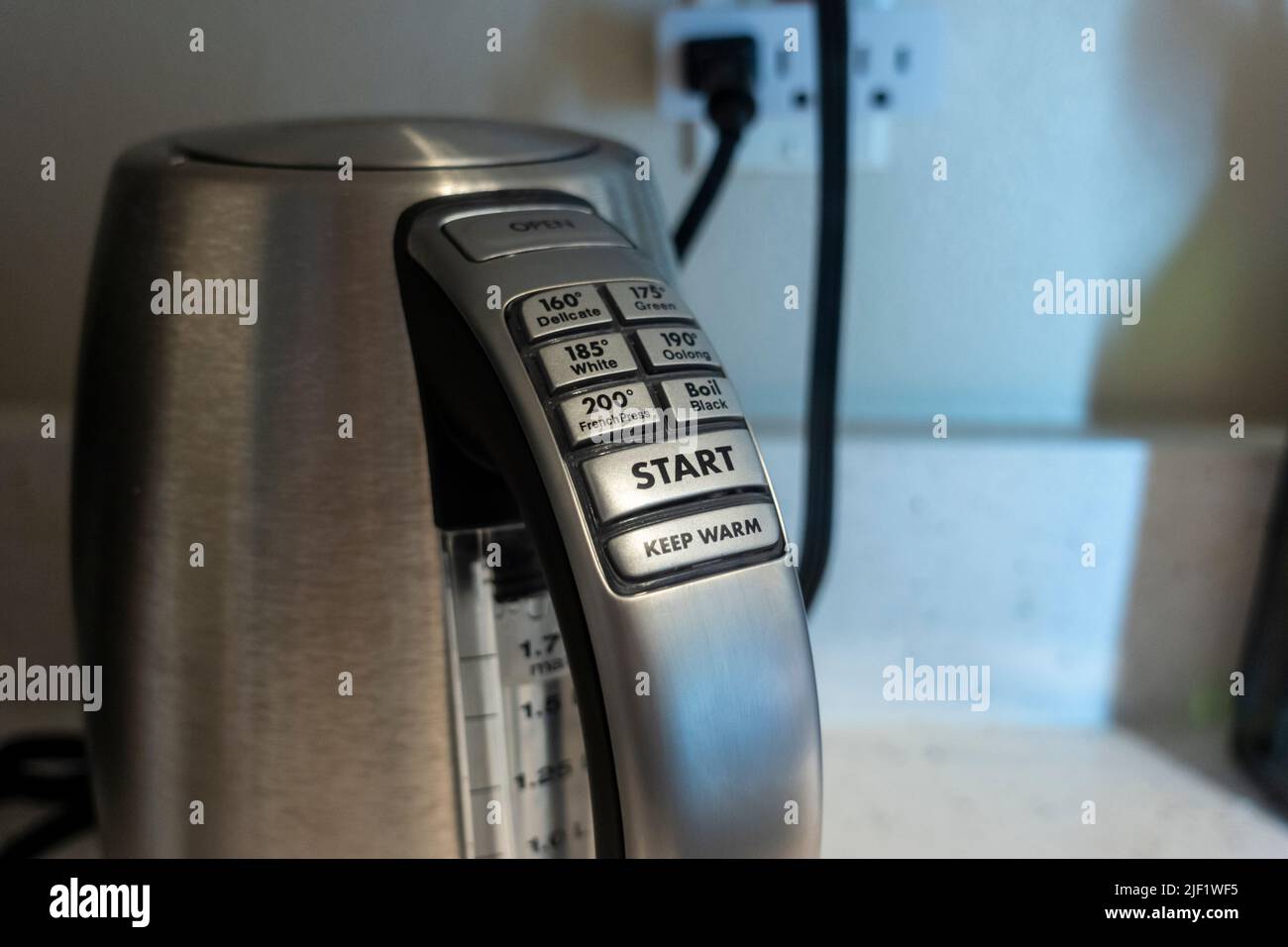 Seattle, WA USA - circa May 2022: Selective focus on a Cuisinart electric kettle inside a domestic kitchen. Stock Photo