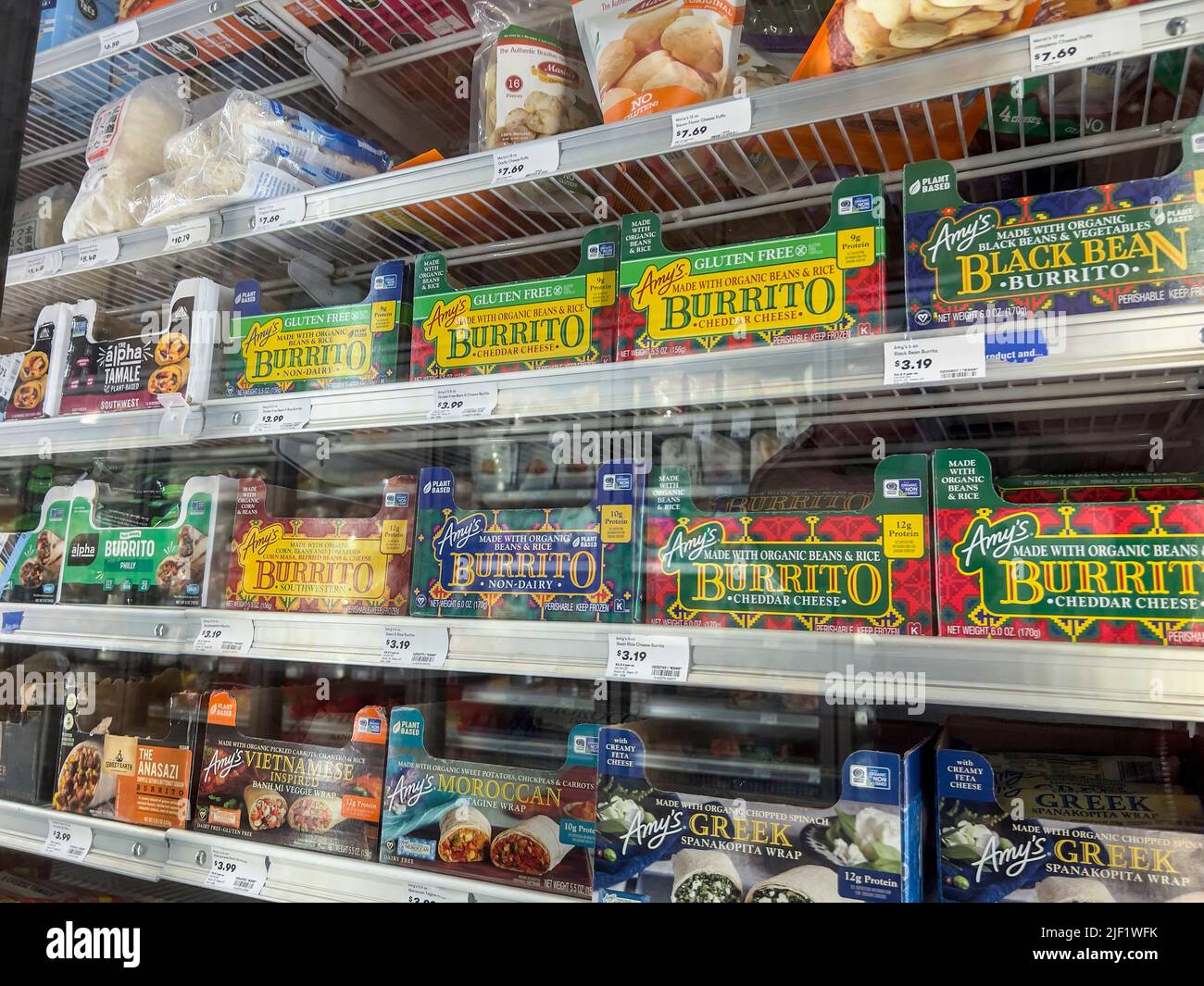 Mill Creek, WA USA - circa May 2022: Angled view of a variety of frozen burritos for sale in the freezer section of a Town and Country grocery store Stock Photo