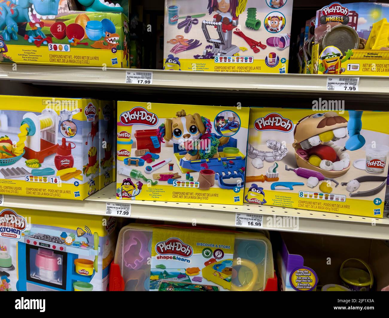 Everett, WA USA - circa June 2022: Close up view of a variety of Play Doh products for sale inside a Fred Meyer grocery store Stock Photo