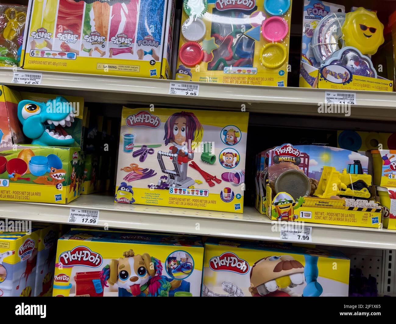 Everett, WA USA - circa June 2022: Close up view of a variety of Play Doh products for sale inside a Fred Meyer grocery store Stock Photo