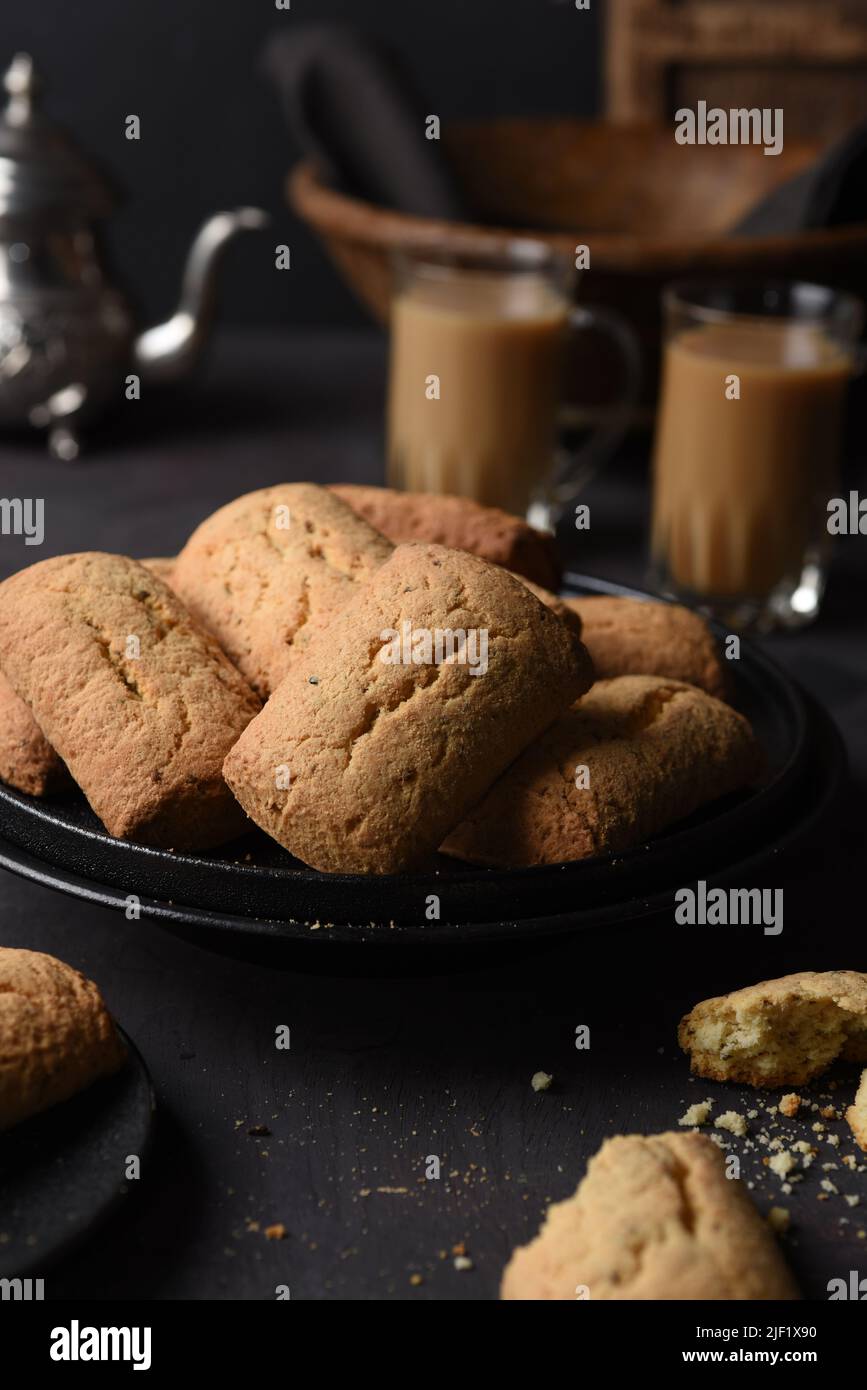 arabic kaak biscuits with coffee on black plate Stock Photo Alamy