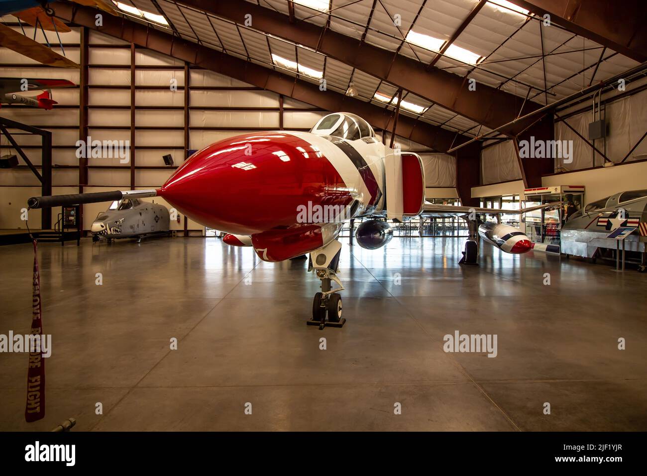 F4E Phantom Fighter Jet On Display In Museum Hangar Stock Photo