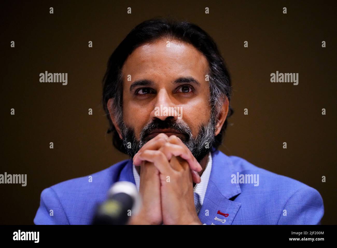 Prabhu Rajan, Counsel to the Chief Coroner for Ontario, reacts