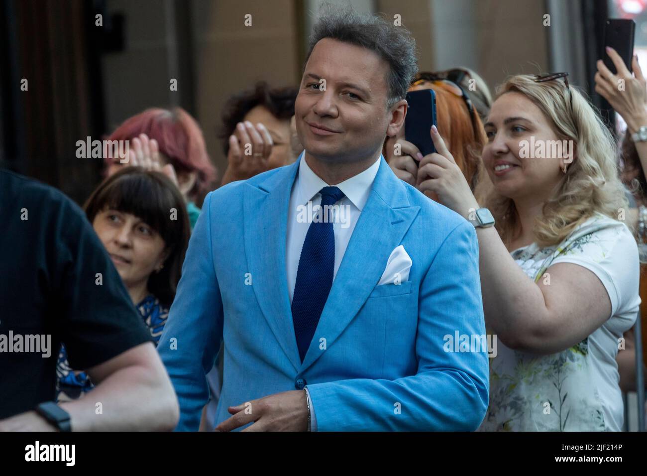 Moscow, Russia. 28th of June, 2022. Actor Alexander Oleshko (C) is seen ...
