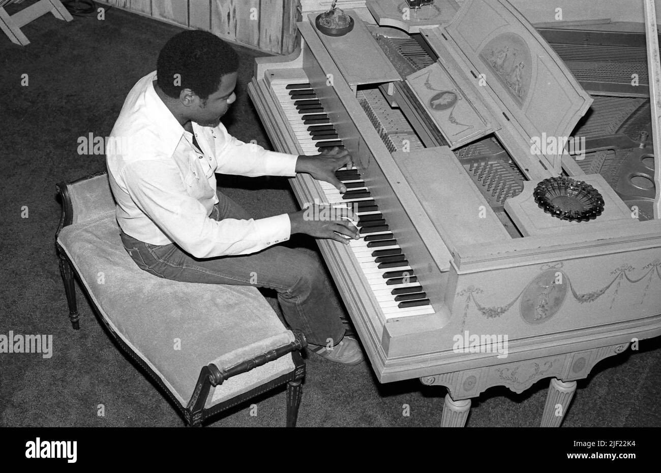 Billy Preston playing piano at home, Los Angeles, Ca 1979 Stock Photo