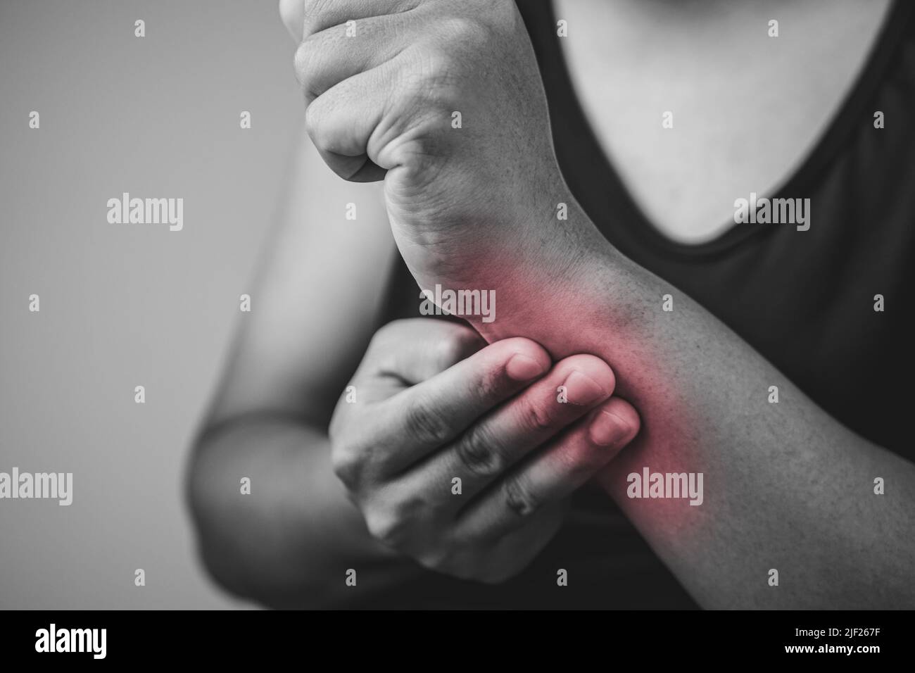 Elbow injury from tennis and golf. The man uses fingers to massage his