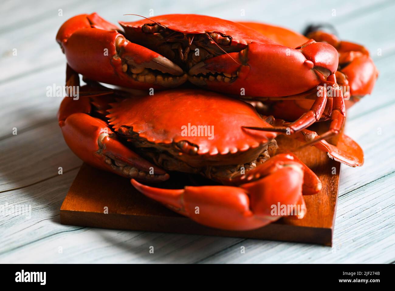 fresh crab on wooden cutting board, seafood crab cooking food boiled or