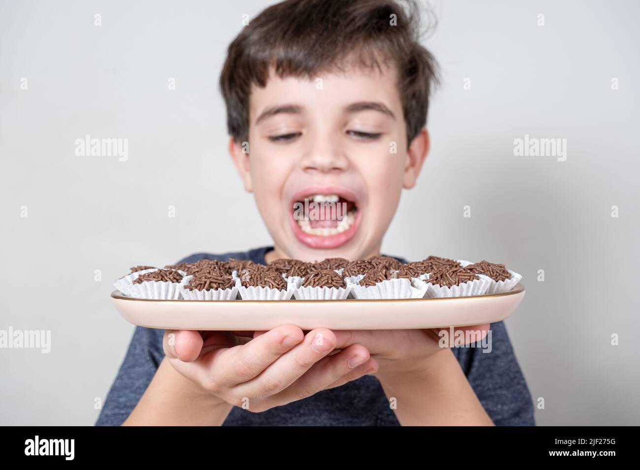 Child eating fudge hires stock photography and images Alamy