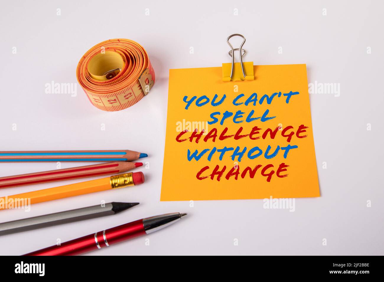 You can't spell CHALLENGE without CHANGE. Text on a piece of paper. Stock Photo
