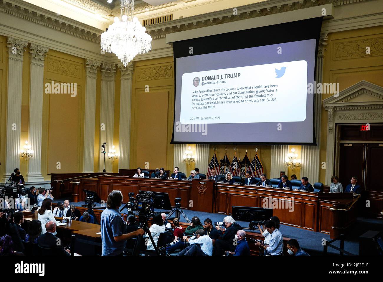 Washington, US, June 28, 2022, A tweet from former President Donald Trump is displayed as Cassidy Hutchinson, a top former aide to Trump White House Chief of Staff Mark Meadows, testifies during the sixth hearing by the House Select Committee to Investigate the January 6th Attack on the U.S. Capitol in the Cannon House Office Building on June 28, 2022 in Washington, DC, USA. The bipartisan committee, which has been gathering evidence for almost a year related to the January 6 attack at the U.S. Capitol, is presenting its findings in a series of televised hearings. Cassidy Hutchinson, top aide  Stock Photo