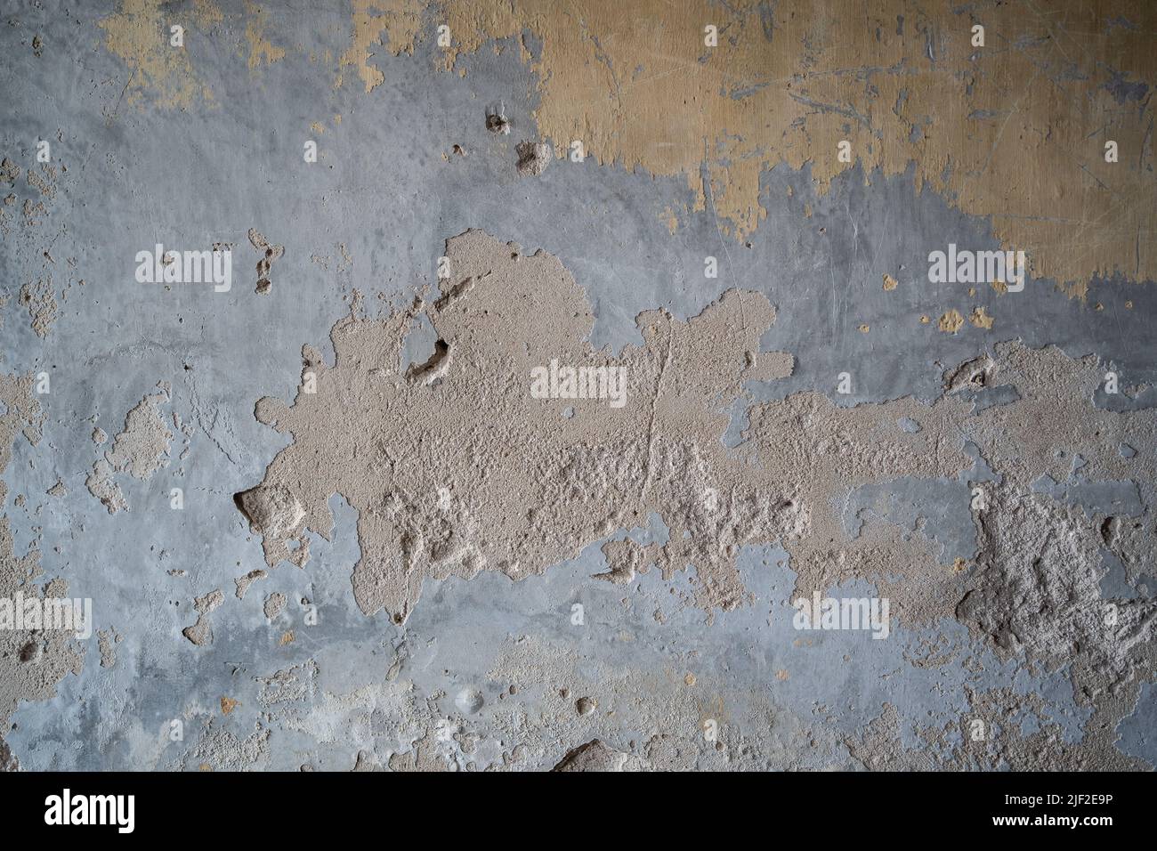 Old wall with peeling paint Stock Photo