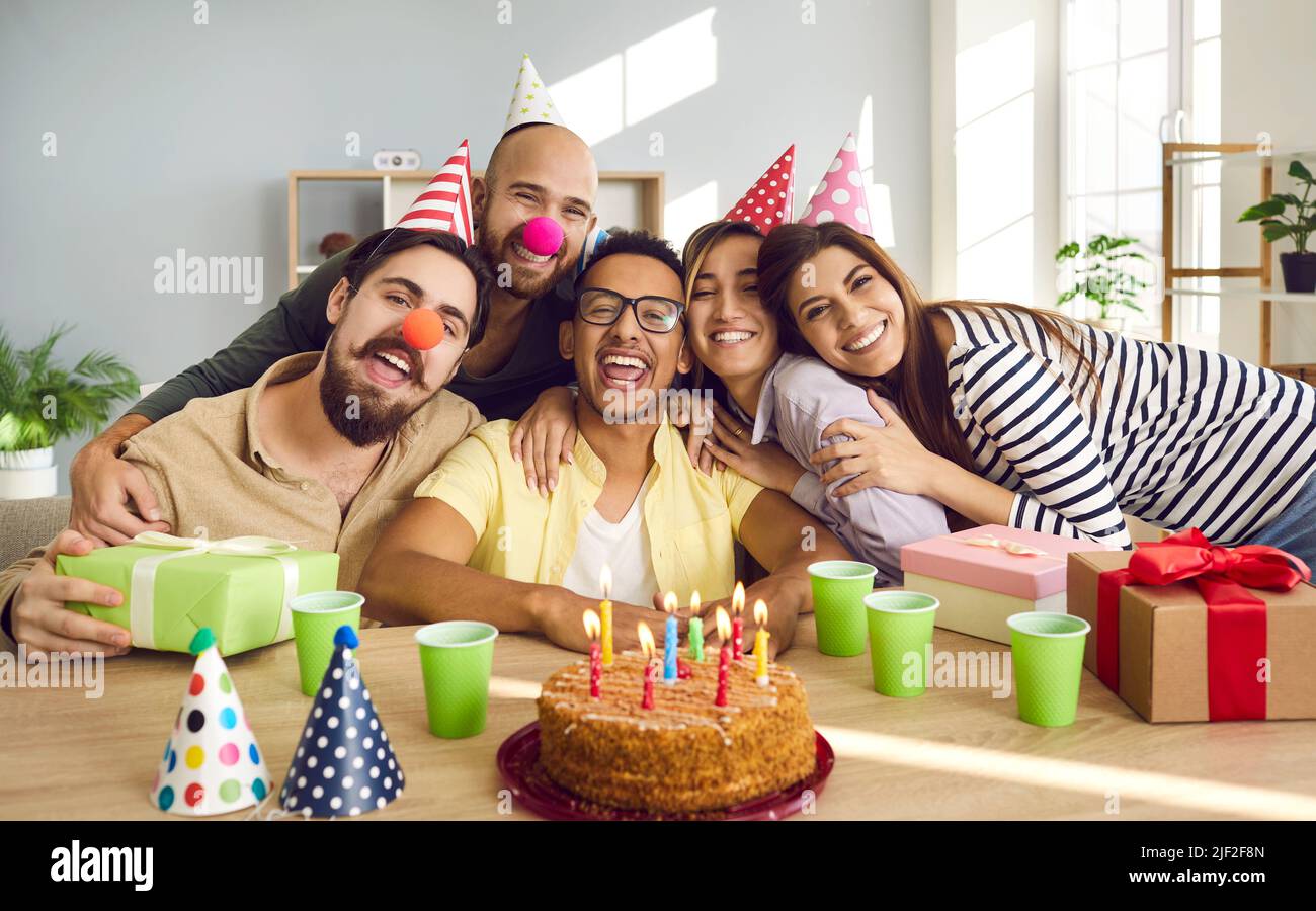 Portrait of happy diverse friends celebrate birthday Stock Photo