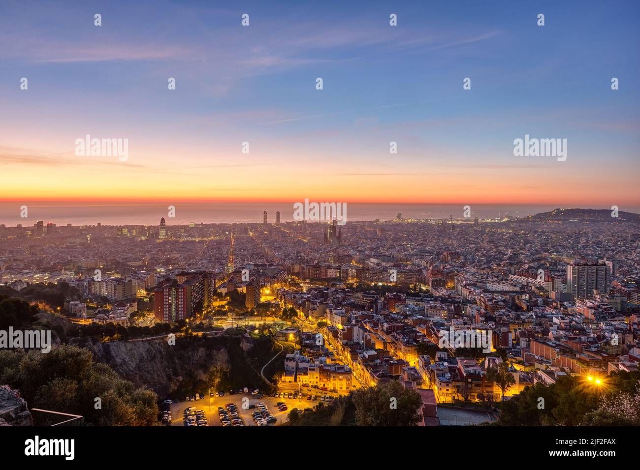View over Barcelona beforse sunset with the Mediterranean Sea in the back Stock Photo