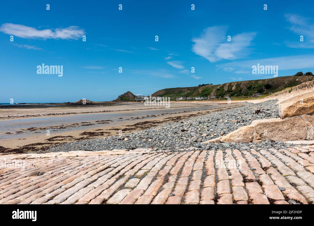 Sea wall and beach at the north end of St Ouen's Bay in Jersey Stock Photo
