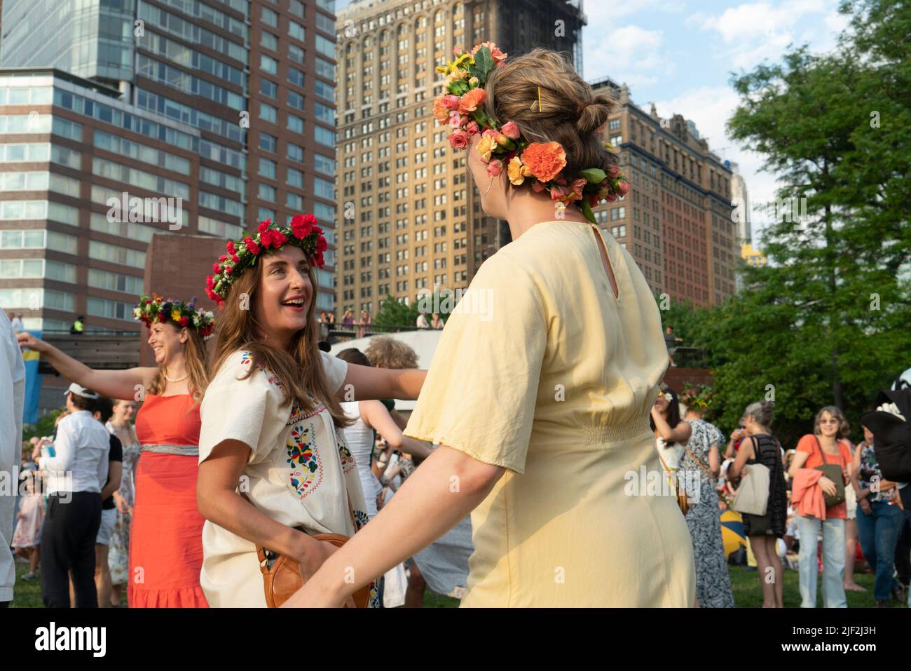Since 1996, thousands of people have come to Battery Park City in Lower Manhattan for the Swedish Midsummer Festival. Stock Photo